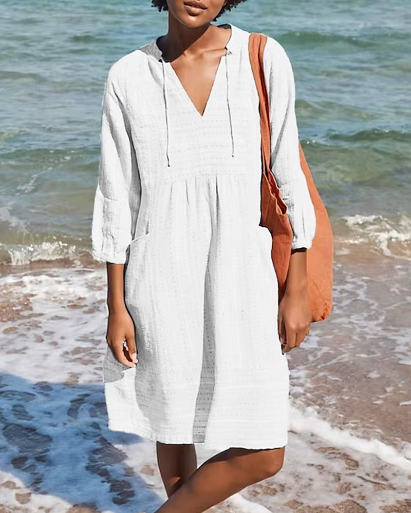 ND | mini-robe en ligne A avec décolleté en V, manches 3/4 et poches