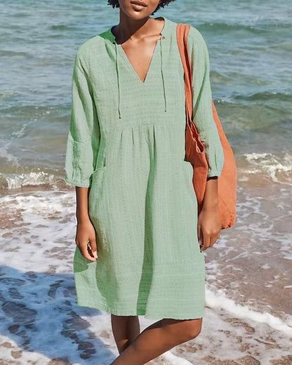 ND | mini-robe en ligne A avec décolleté en V, manches 3/4 et poches