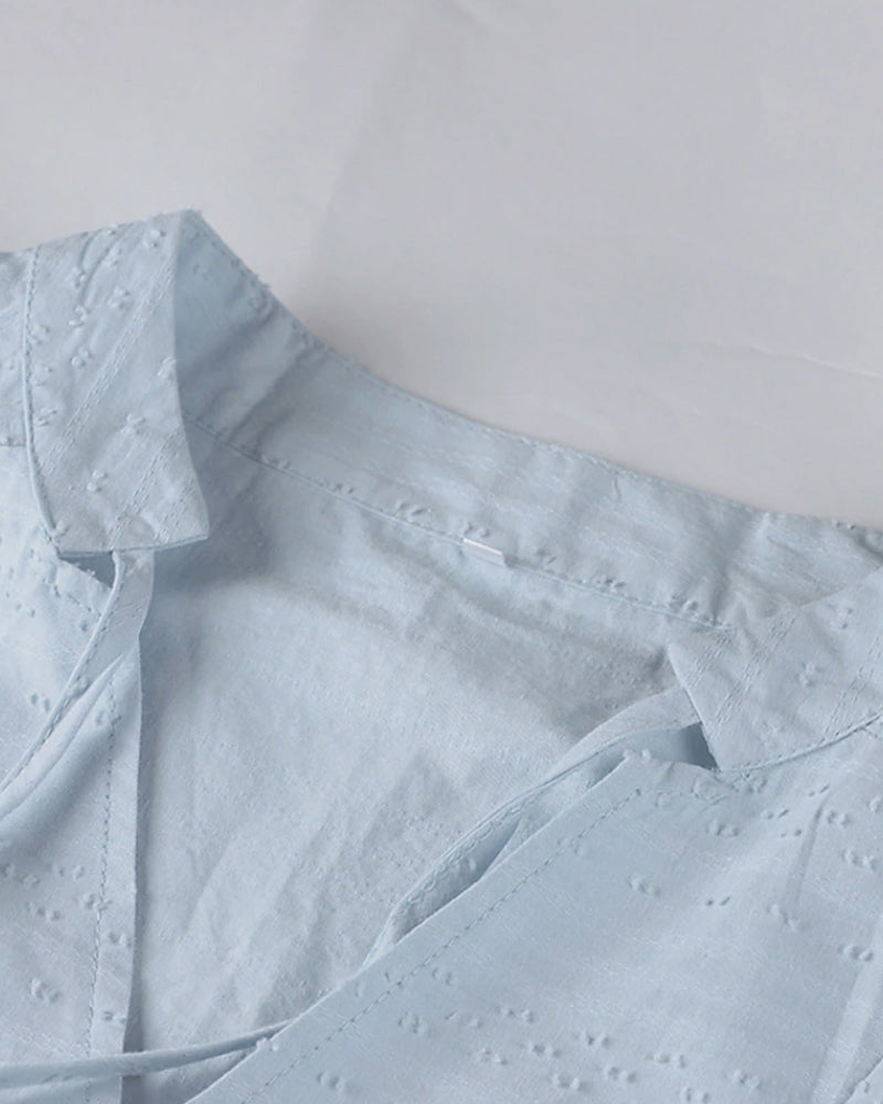 ND | mini-robe en ligne A avec décolleté en V, manches 3/4 et poches