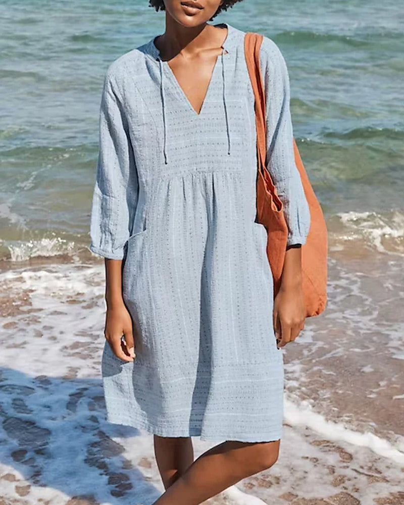 ND | mini-robe en ligne A avec décolleté en V, manches 3/4 et poches
